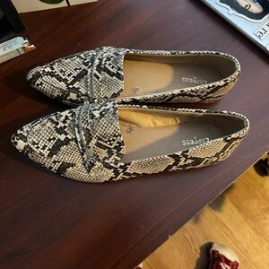 Express snake skin flat/ work shoe.